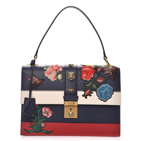 gucci blue and red striped bag|gucci official website.